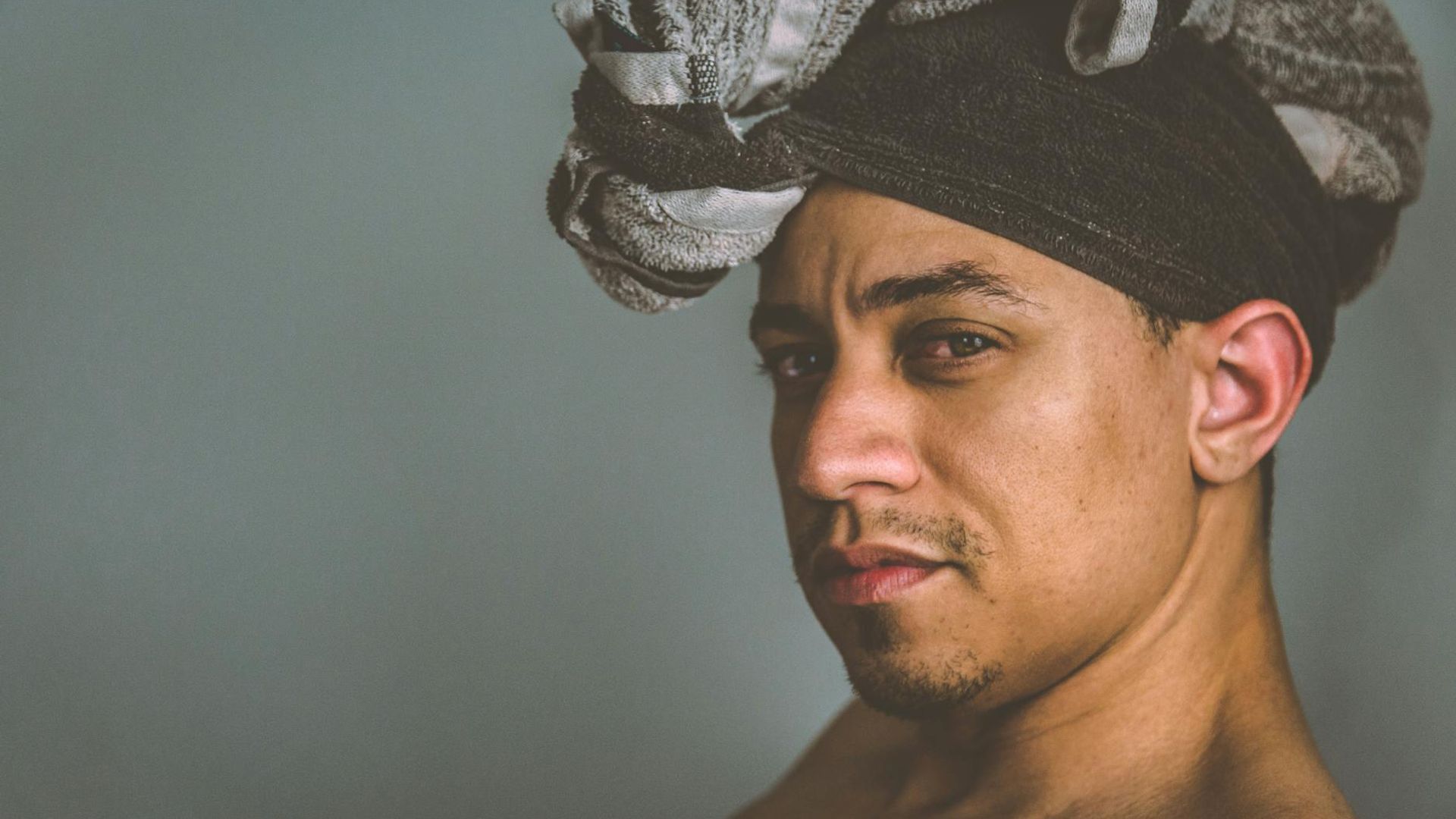 Person looking into the distance with a calm focused expression